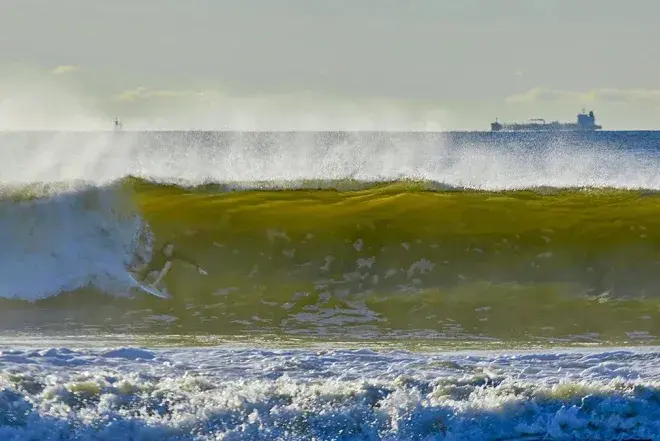 Surfing Rockway Beach - Photo Credit Tad Mask