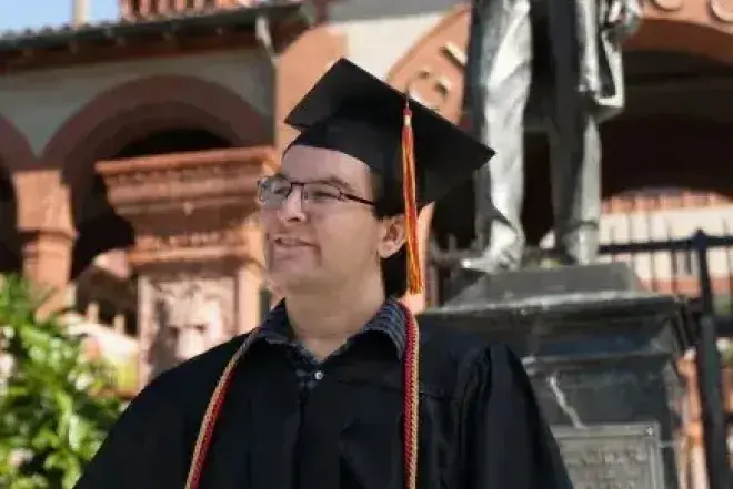 Student in cap and gown