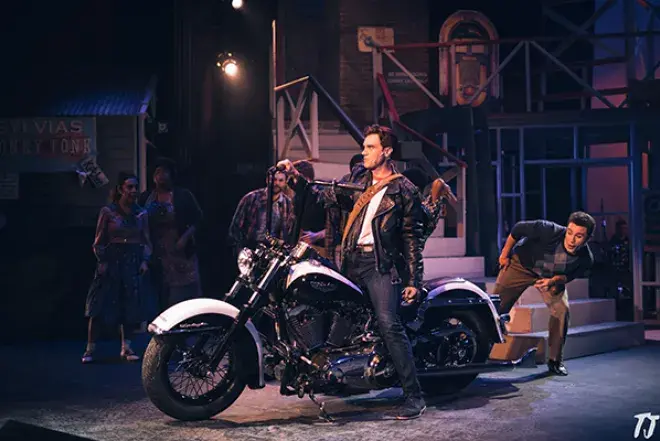 Student on motorcycle in All Shook Up 