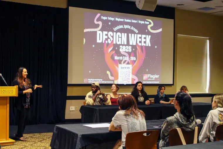 Design Week 2025 graphic on big screen in Virginia Room