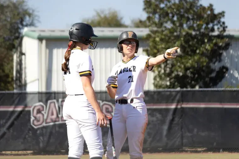 Emily Ricci directs her teammate as captain of the Flagler softball team