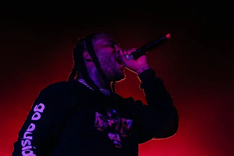 Waka Flocka rapping into the mic at Flagler Fest