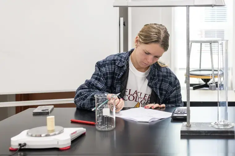 Zoie Marchant analyzes some data while in the science lab