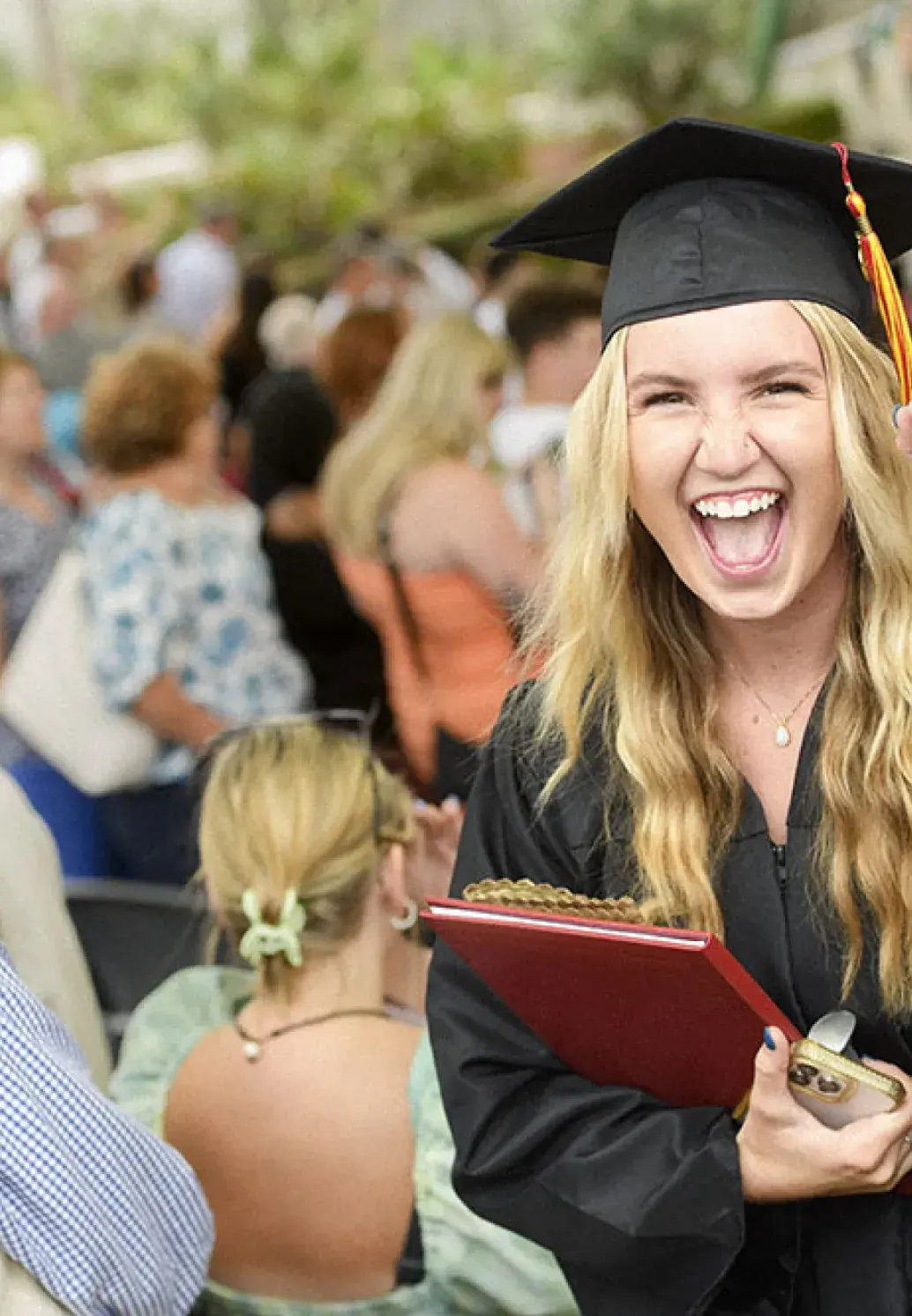 Student celebrating her graduation