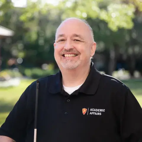 Flagler College staff member Phil Pownall is shown. 