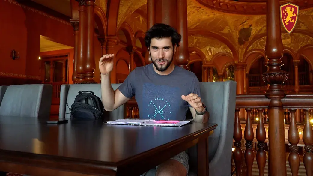 Student sitting at a table in the Dining Hall