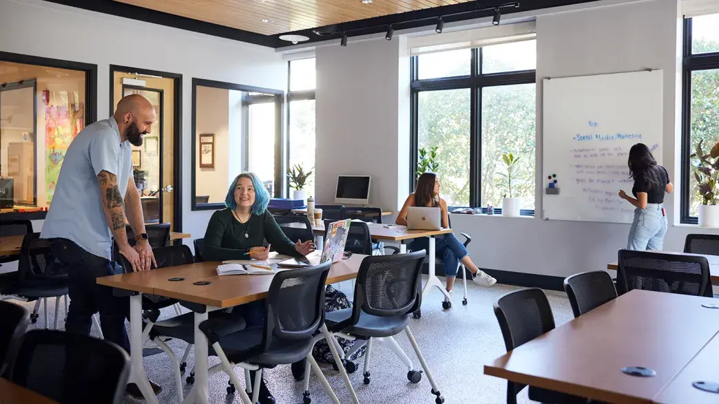 Professor speaking to students in the Brown Innovation Center