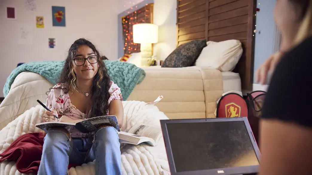 Students hanging out in their residential room