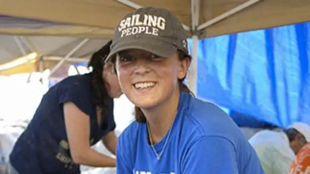 A student smiles.