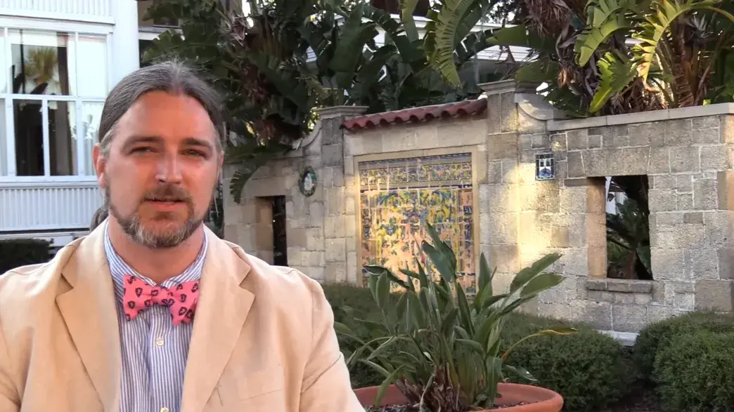 Zachary Cole standing outside of Markland House