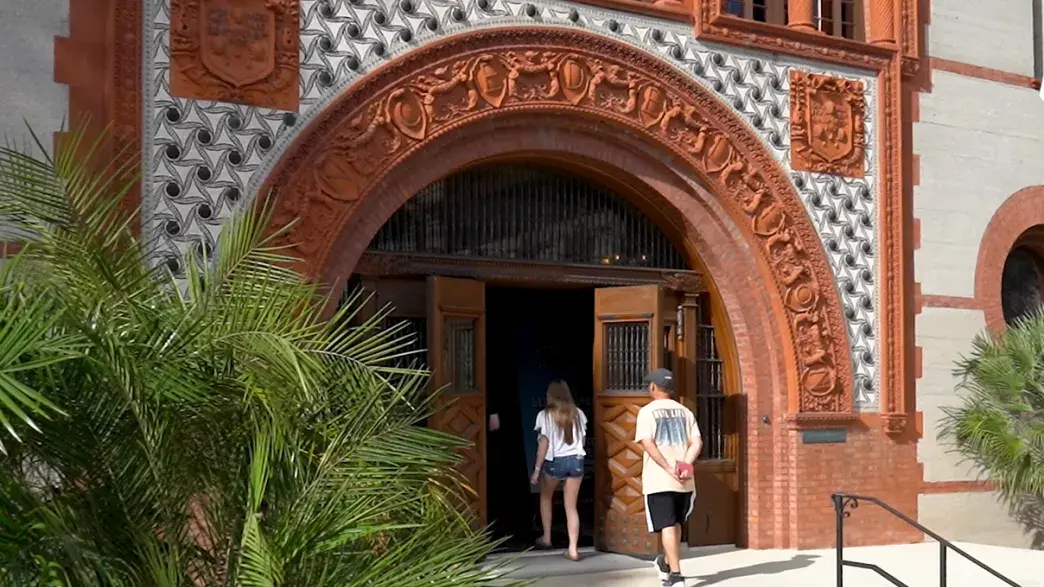 People walking into Ponce Hall