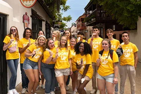 Student orientation leaders having fun on St. George Street 