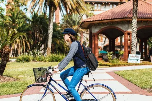 Exploring St. Augustine, Student on a Bicycle 
