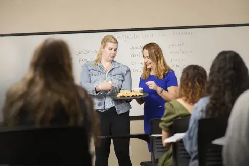 Students participating in a French class