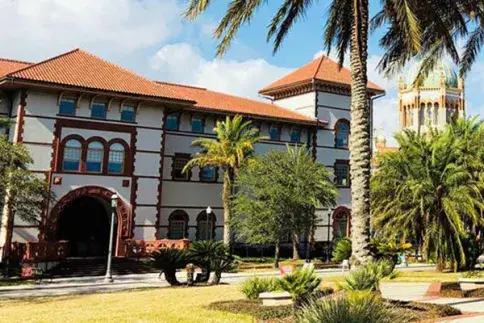 The front entrance of the Proctor Library on a sunny day. 