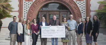 Siemens Grant Check Presentation in Ponce Courtyard