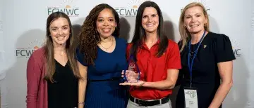 2024 Healthiest Companies Award - Wellness Committee members with award