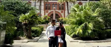 Shylowe Sortman and Florian Langer stare at eachother lovingly outside of the Ponce