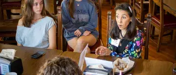 PRSA Executive Linda Beltran speaking with students at her lunch and learn event