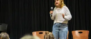 Alexandra (Ally) Olejniczak giving her speech during the annual COM Week Speech Competition