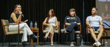 Maggie Windle asking the panel a question