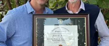 Ben Platt and Professor Jim Makowski holding certificate for scholarship