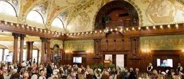 A wide shot of Power of the Purse attendees in the Ponce Dining Hall