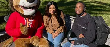 Lewis the Lion was all smiles as he welcomed new Saints to campus