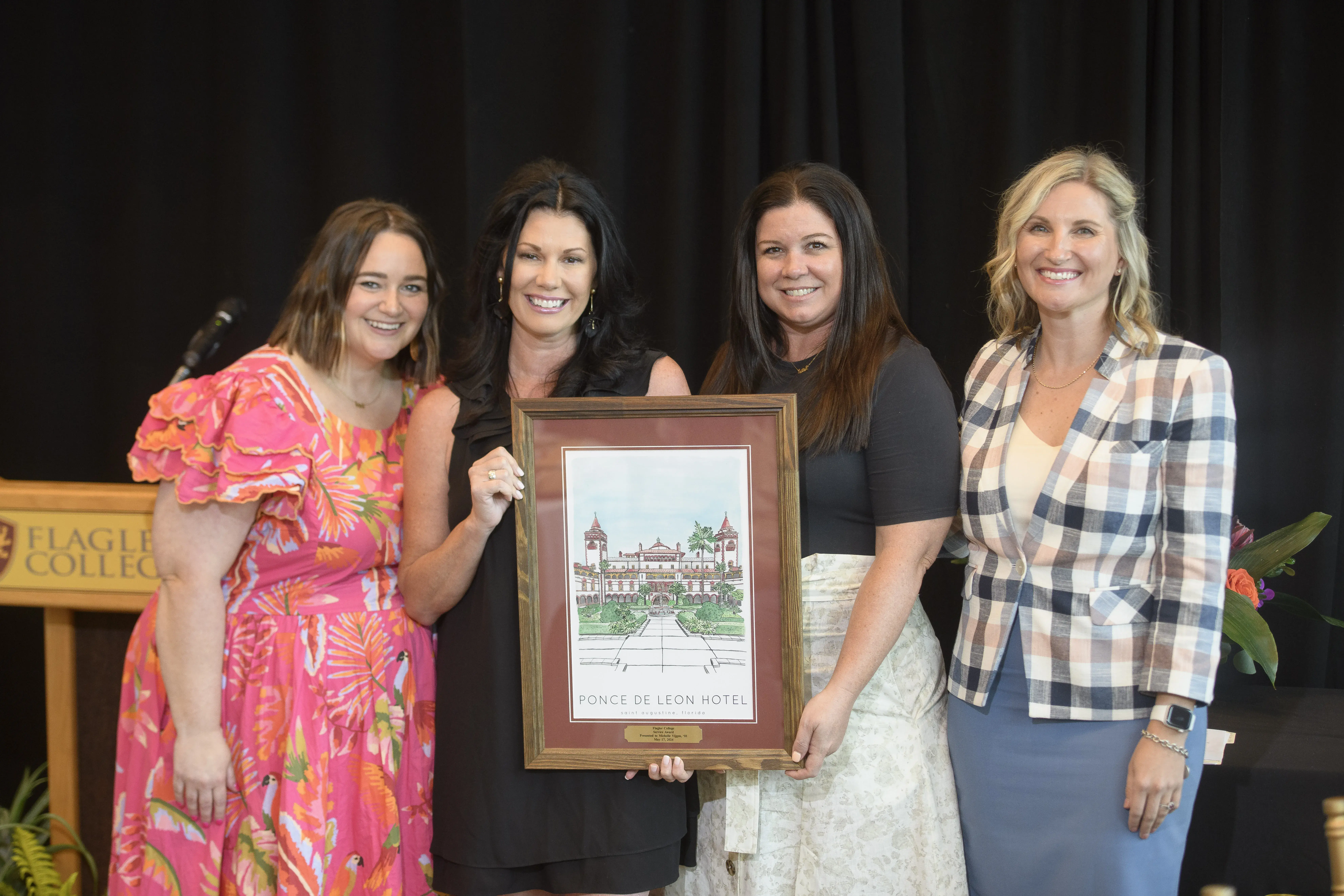 Michelle accepeting Alumni Award