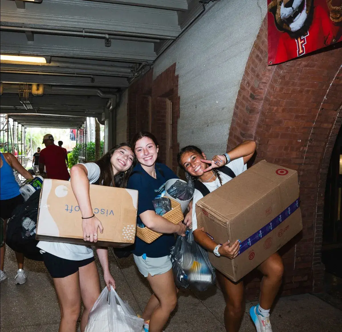 Students with boxes on Move-In Day
