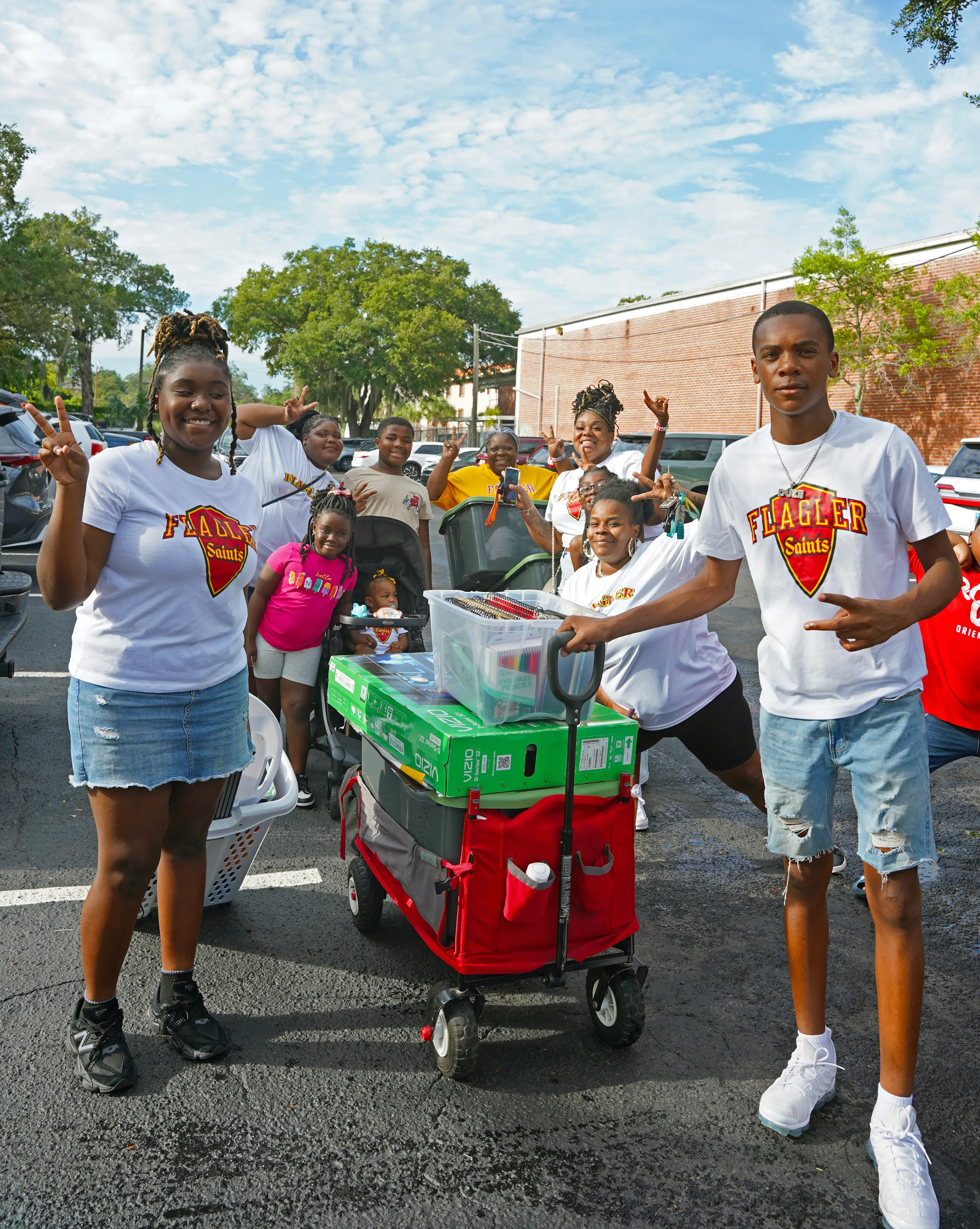Family in parking lot on Move-In Day