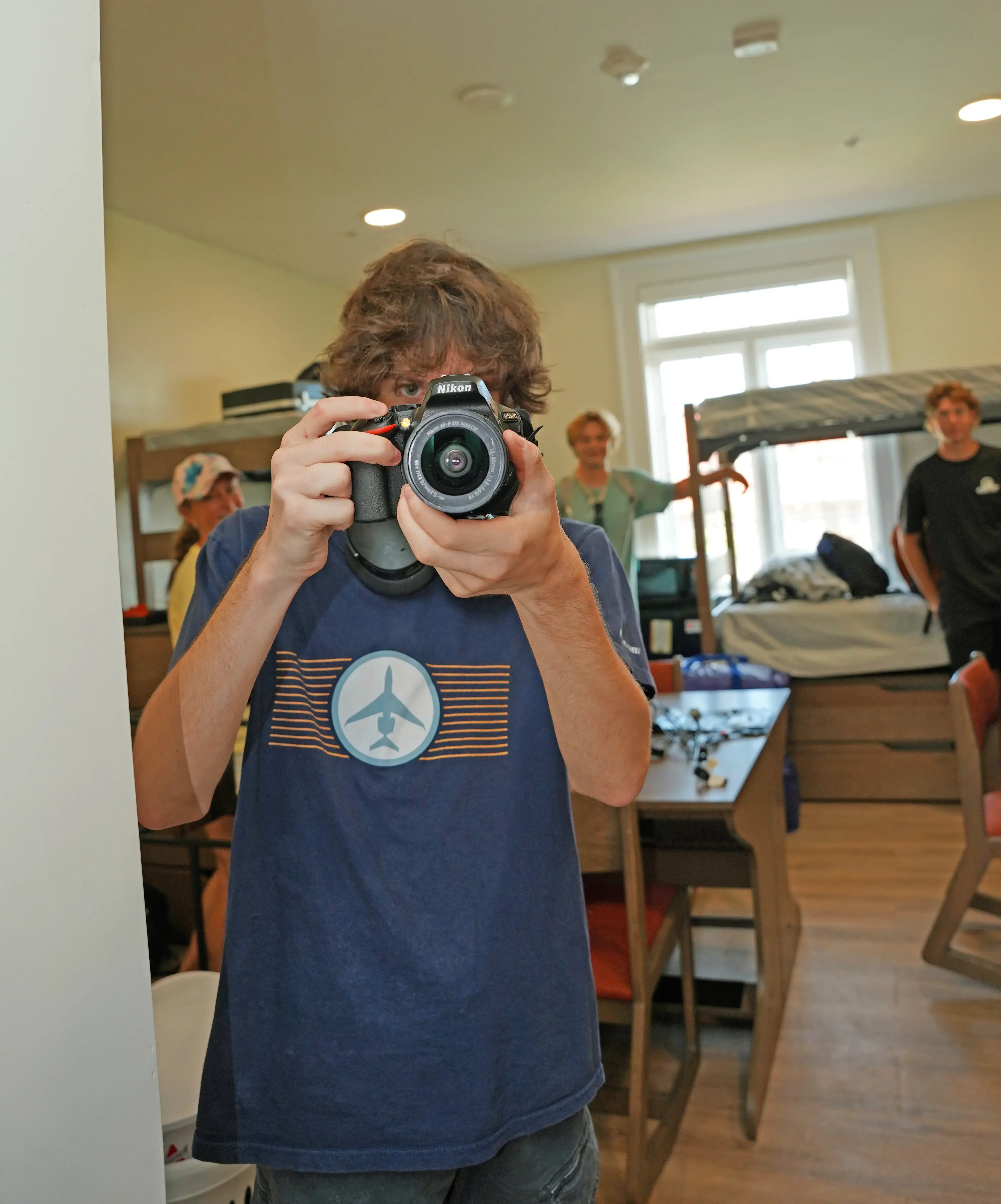 Student taking a photo of photographer on Move-In Day