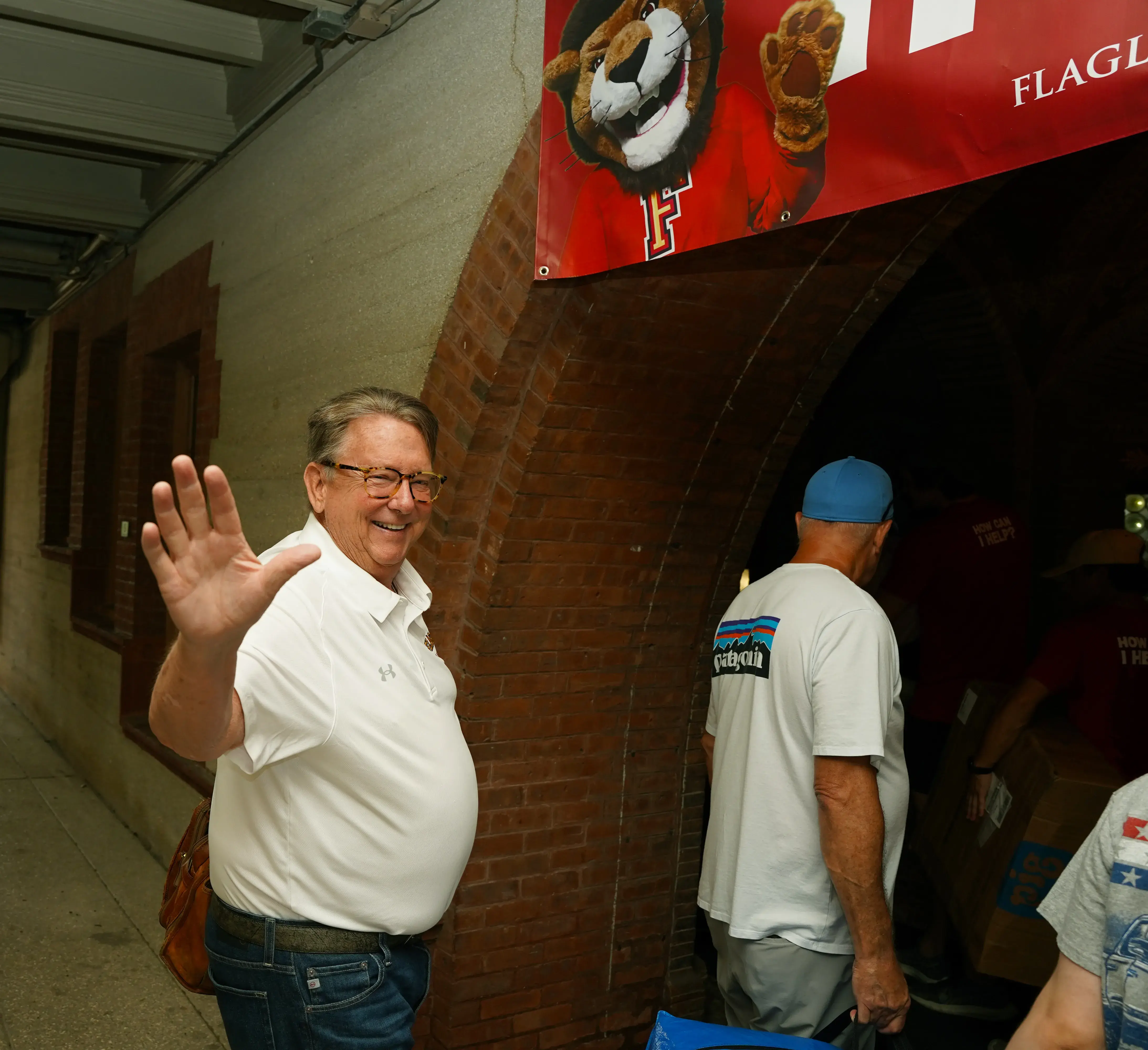 President Delaney waving at Move-In '24