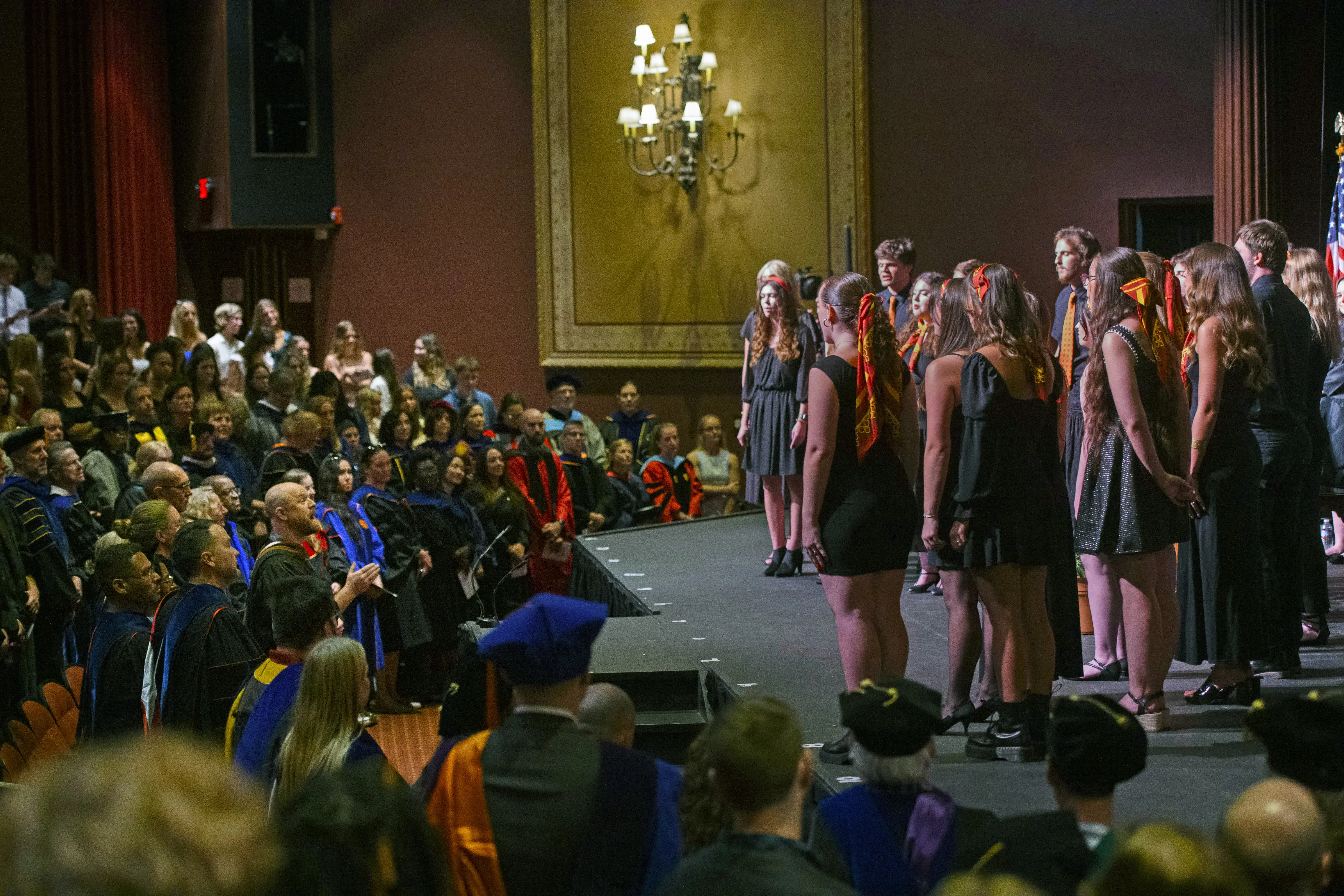 Kip Taisey directing choir, Convocation '24