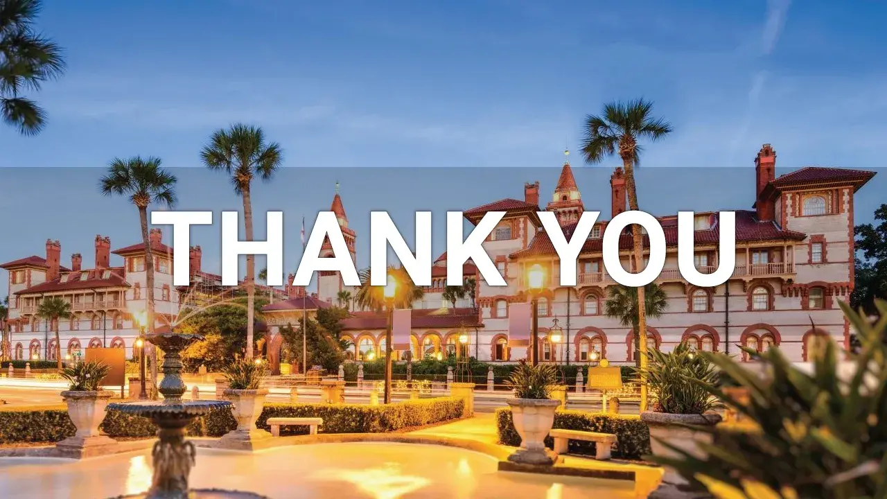 Wide night time photo of the Ponce. "Thank You" is written in large letters across the center of the image.