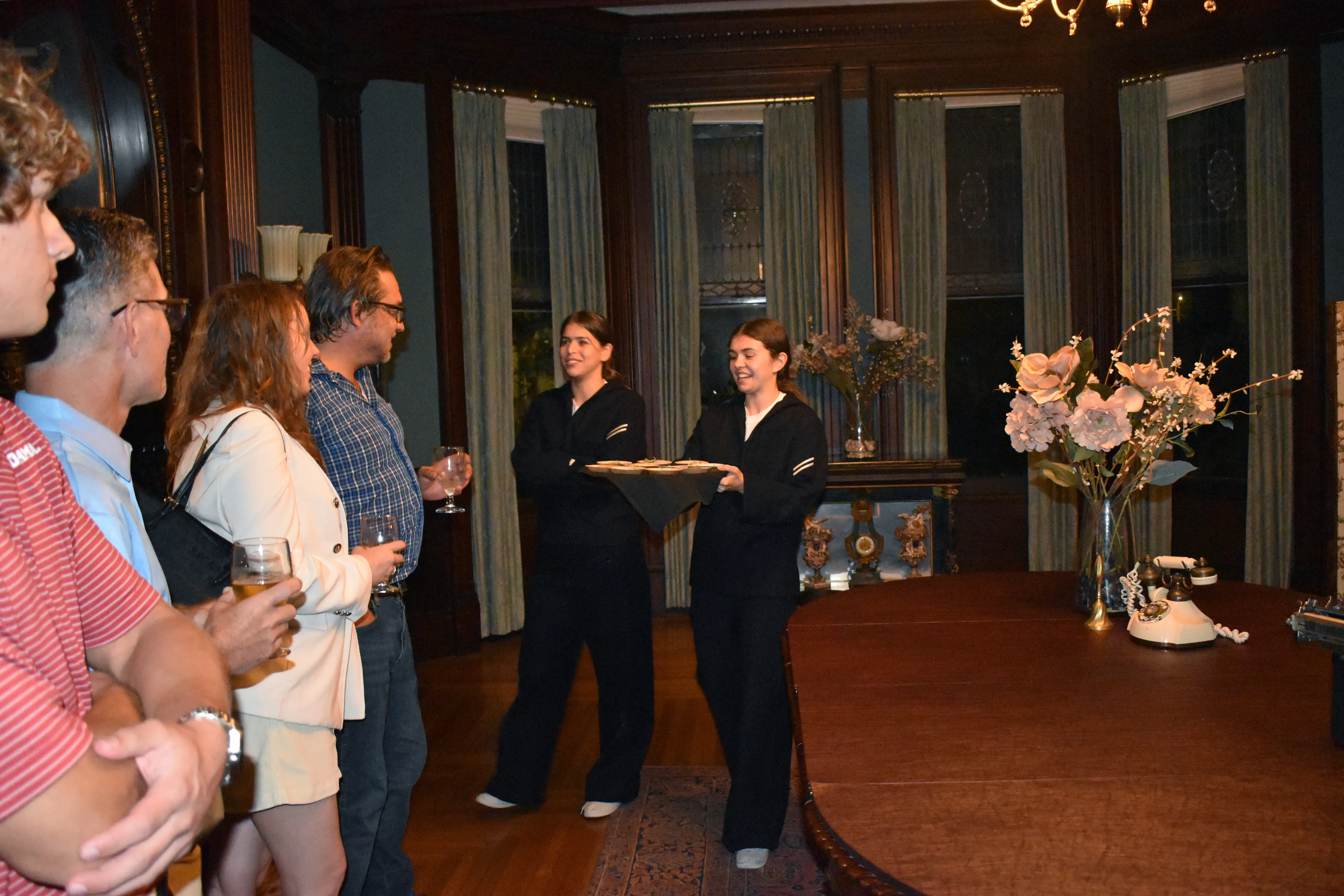 "WWII soldiers" passings food in dining room