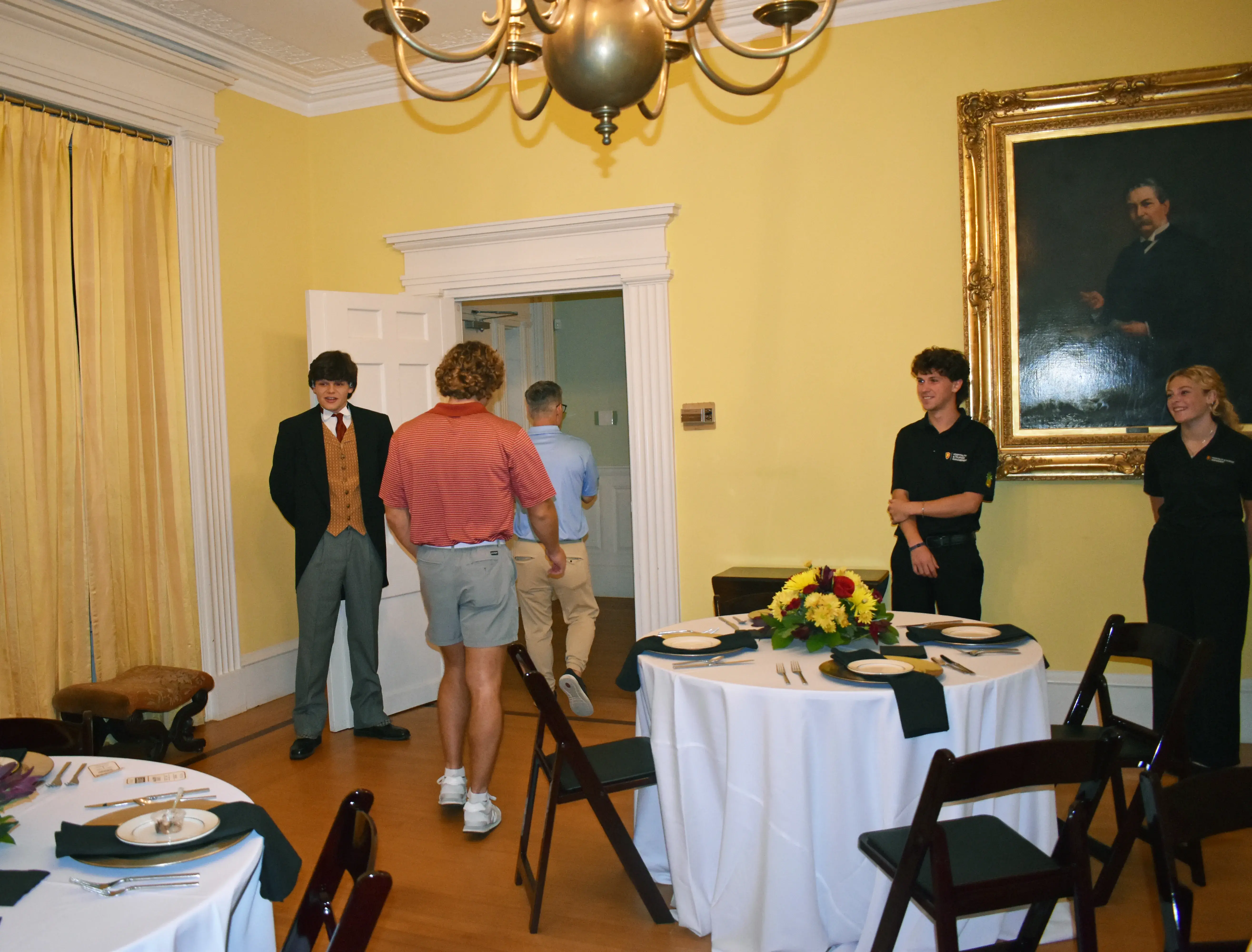 "Henry" and HTM students bidding farewell to guests