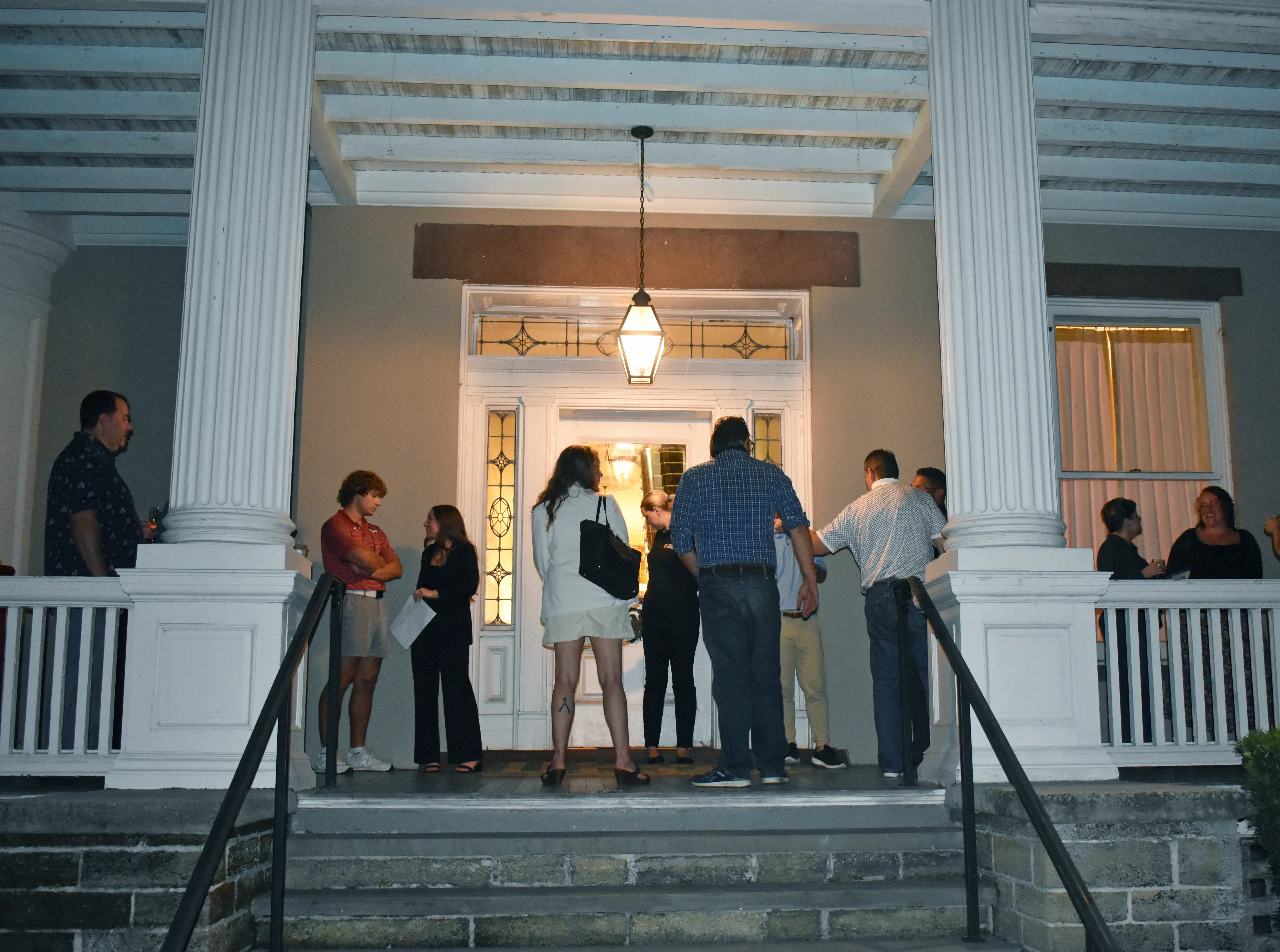 Guests, Peck on front porch of Markland- wide shot
