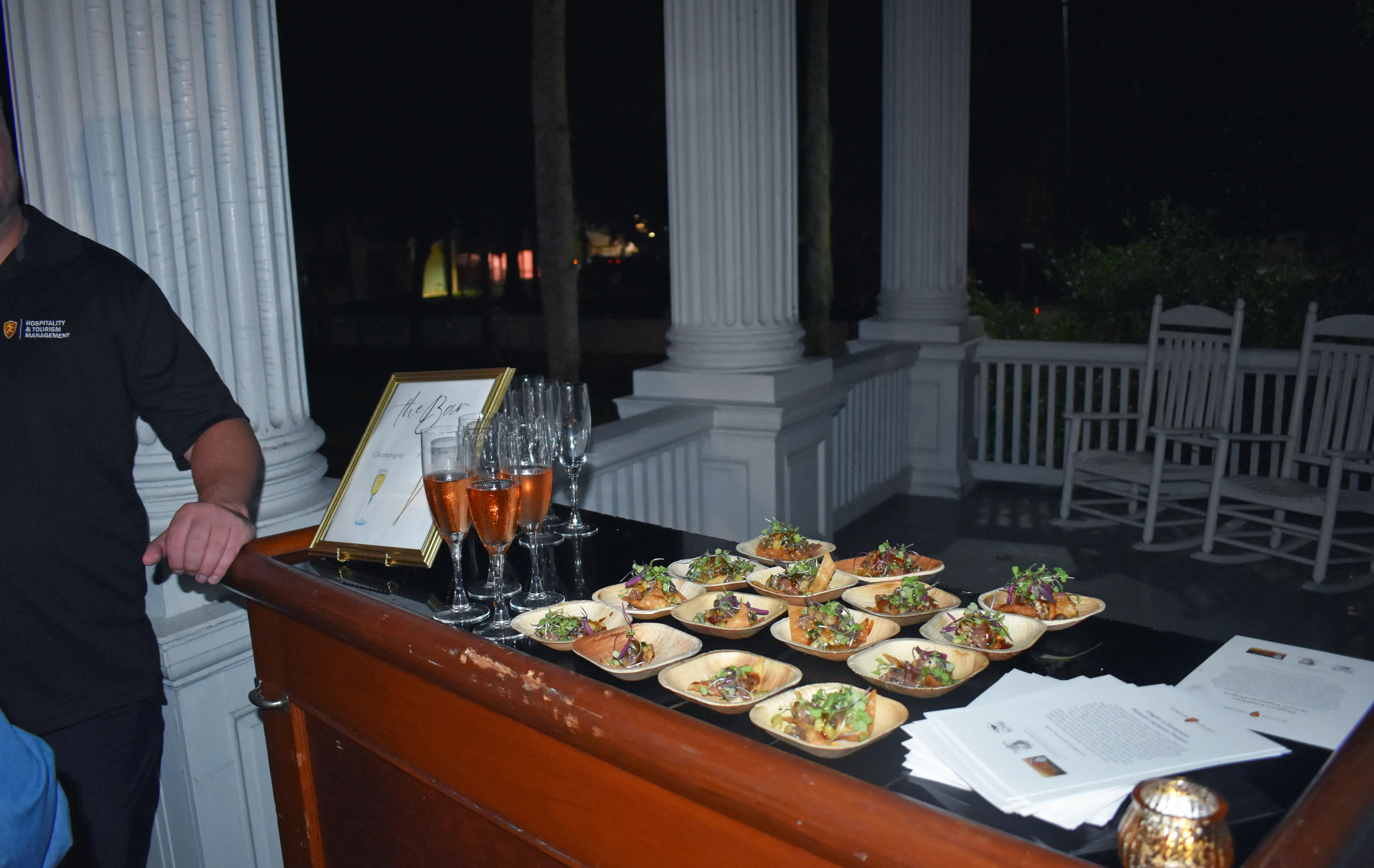 Bar with drinks and appetizers on Markland front porch