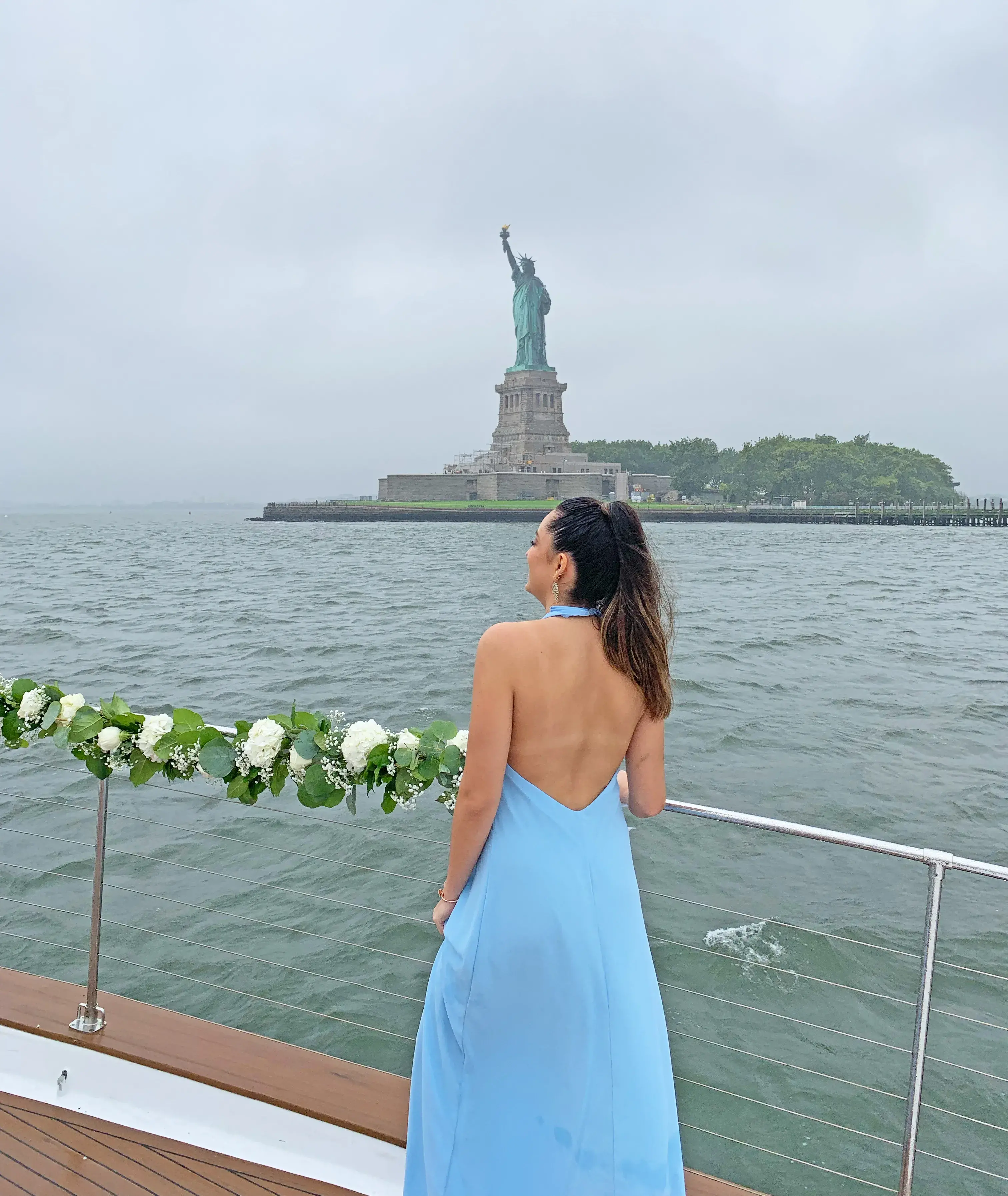 Fernanda with Statue of Liberty in the background