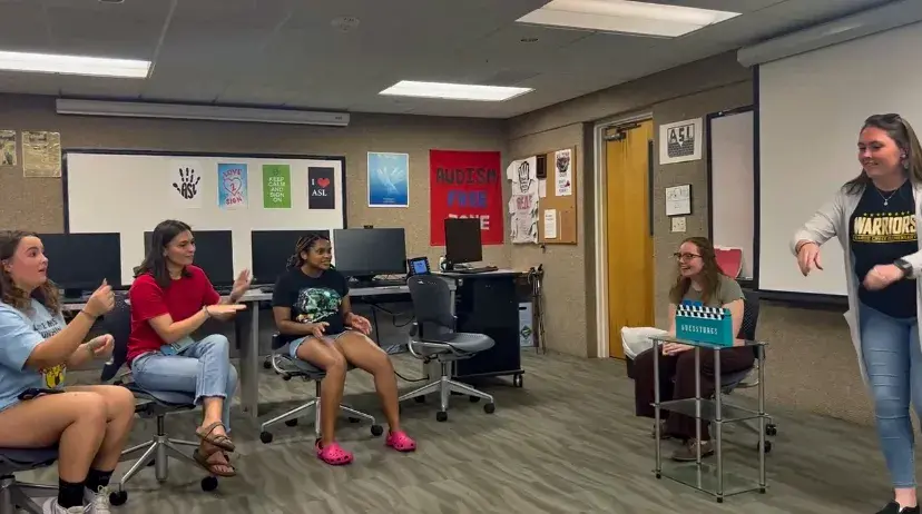 Students playing"guess"-tures in ASL Lab 2022