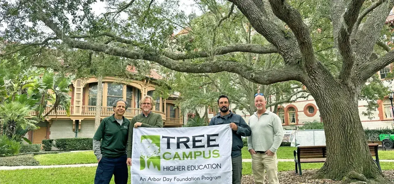 Tree Campus banner held by Tree Campus Advisory Committee