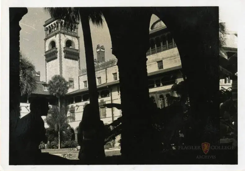 shadows of early students in Ponce courtyard