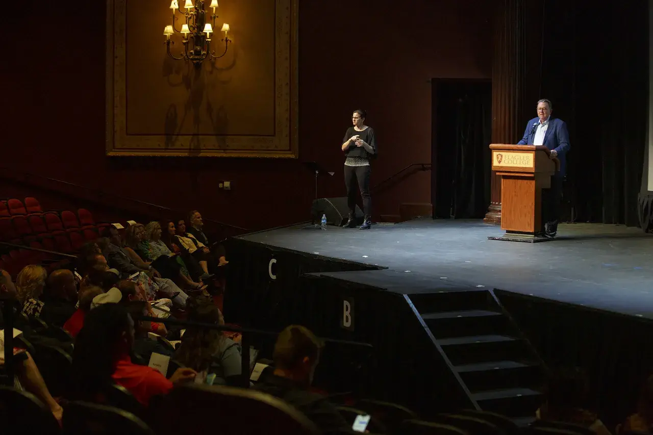 Delaney on Stage at Employee Recognition Ceremony