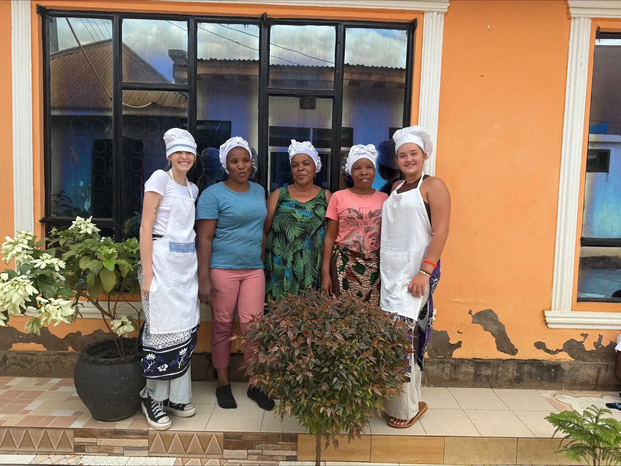 Nateleigh Nachreiner in apron with three other women