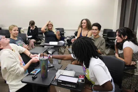 Read the Room club meeting - students laughing and talking