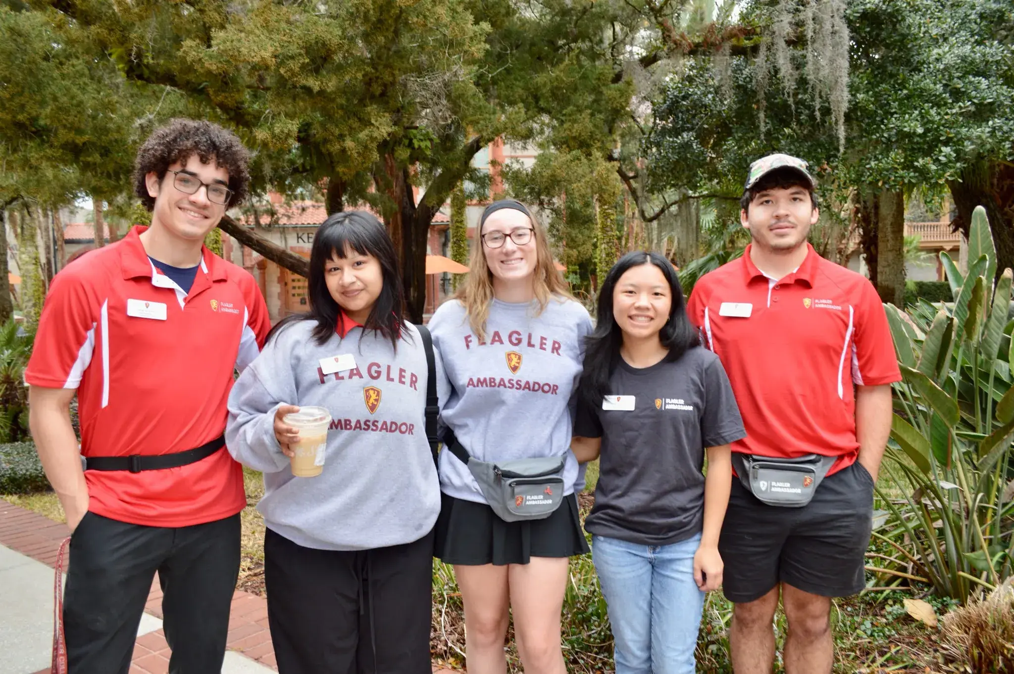 A large group of student ambassadors pose for a photo