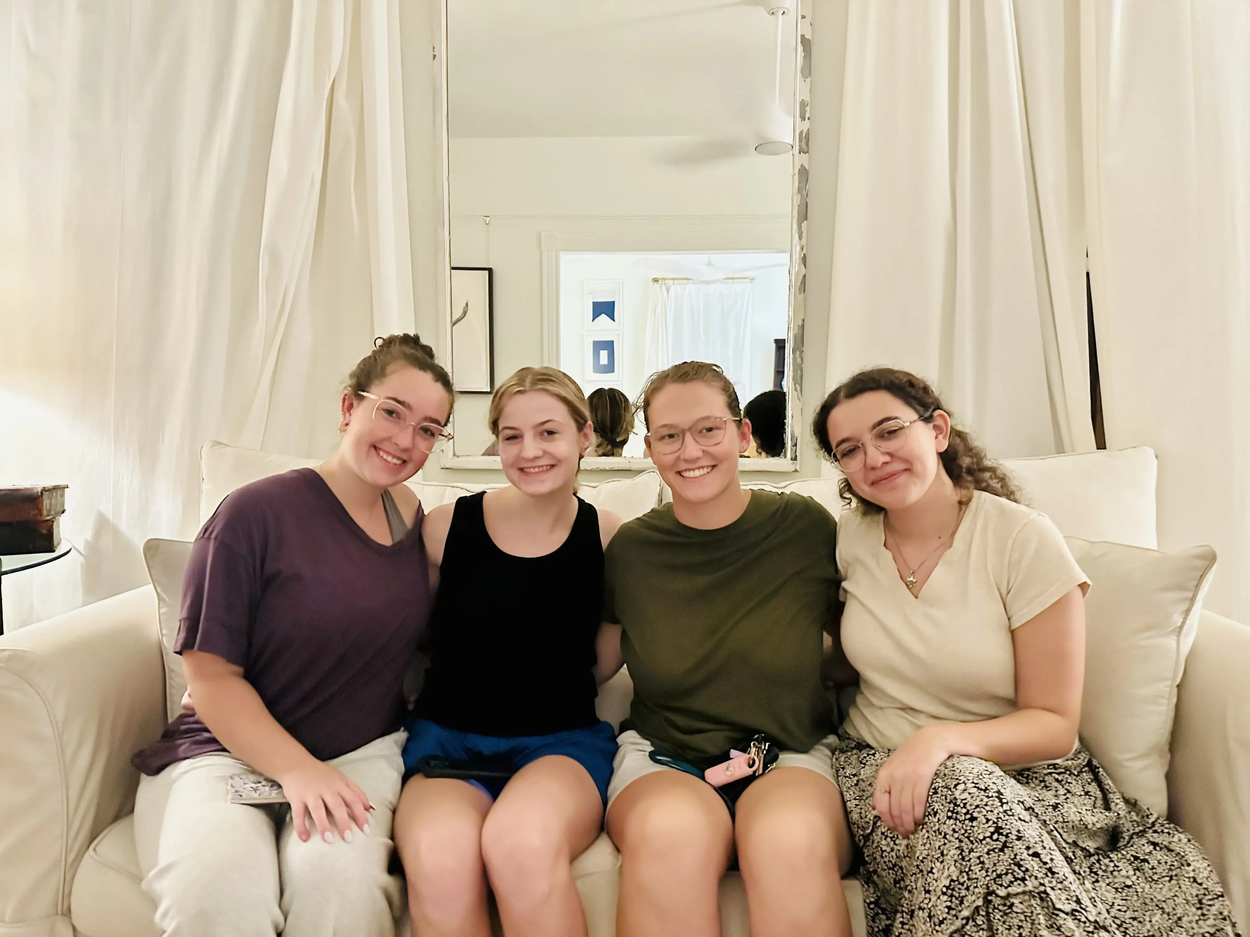 Maddie Nilan sitting with some of her friends from the Deaf Awareness Club