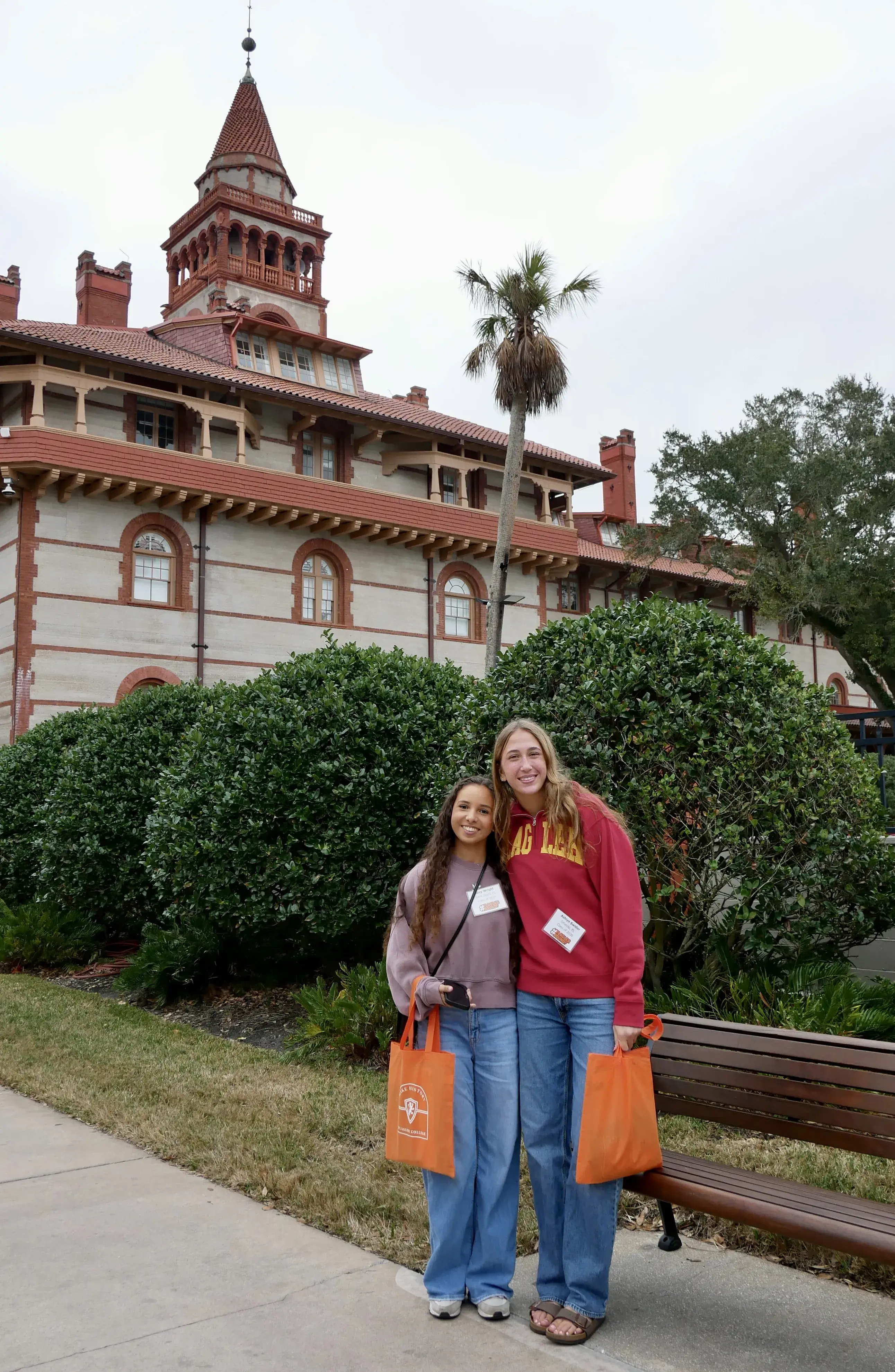 Two incoming students pose for a photo in front of Ponce De Leon Hall