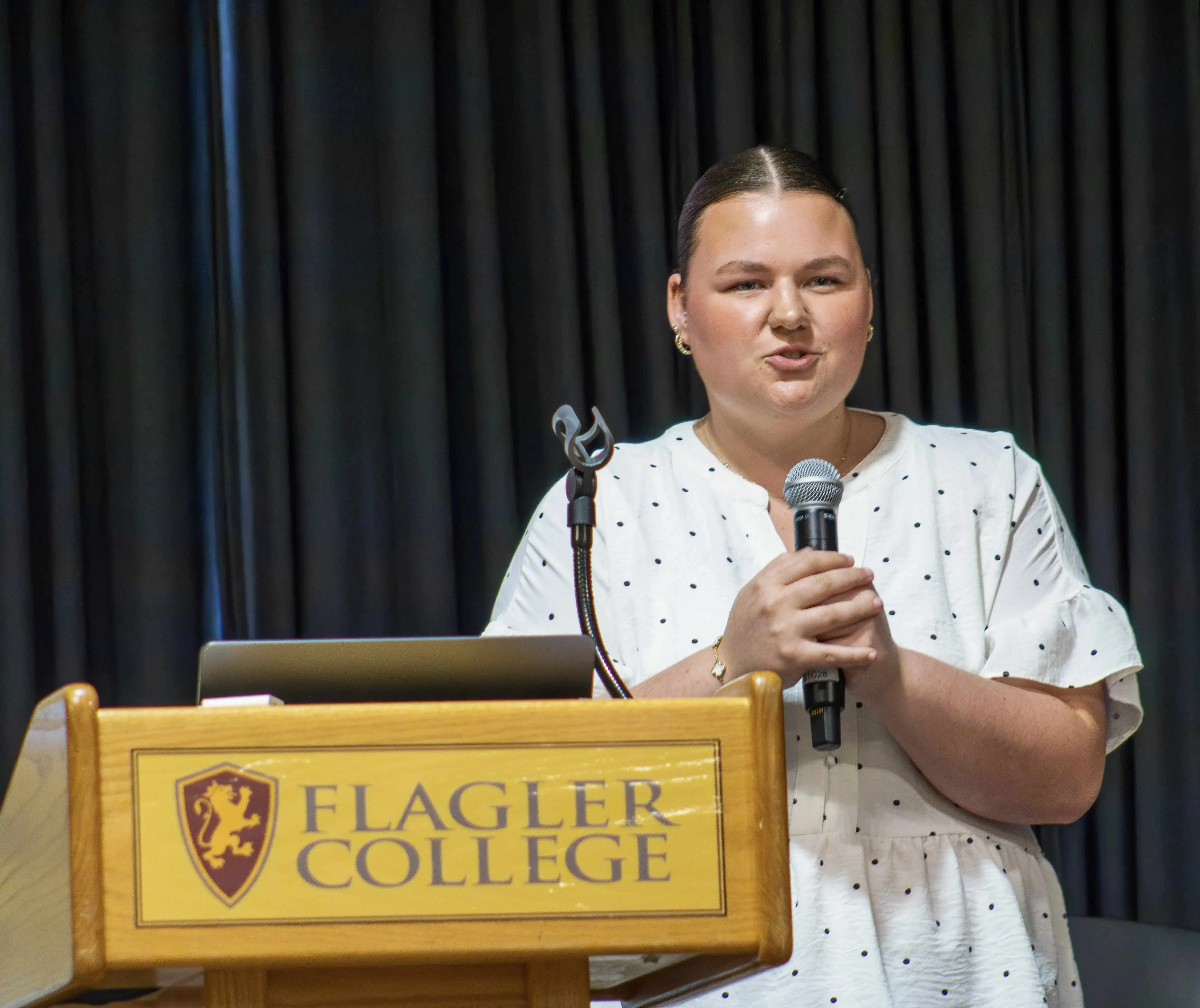 Katelyn Sementelli giving her speech during the annual COM week Speech Competition
